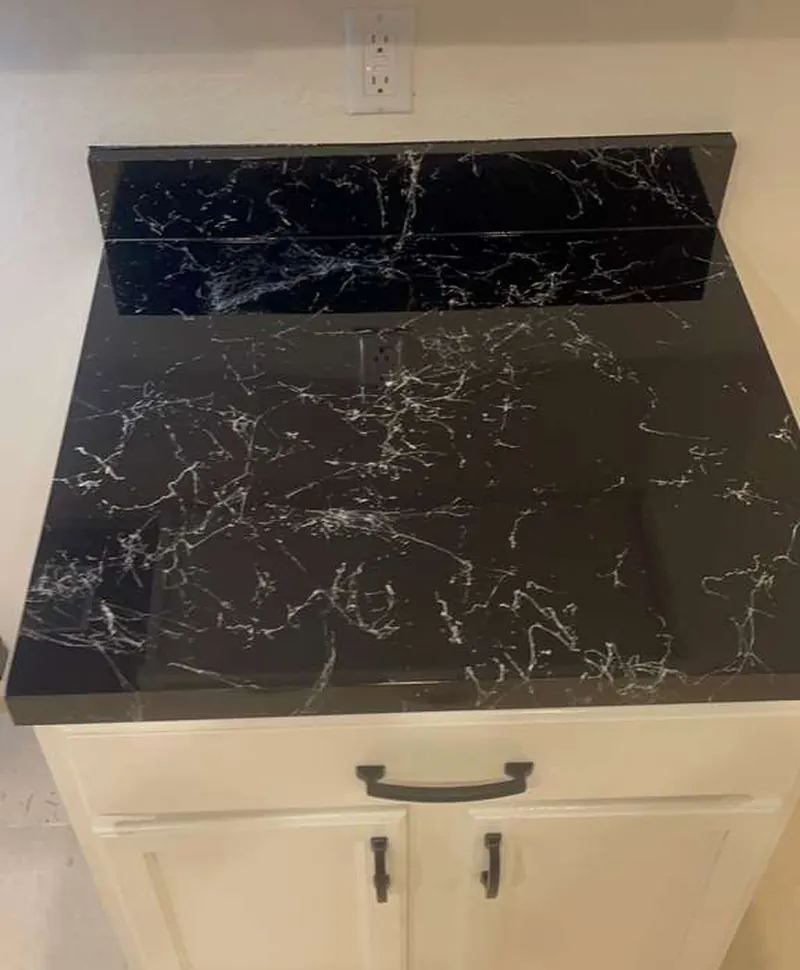 Seamless black marble epoxy countertop coating installed in Kissimmee FL.