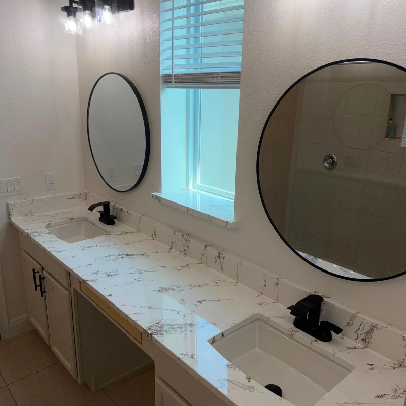 custom-calacatta-marble-epoxy-countertop-after-kissimmee. High-gloss white Calacatta marble epoxy countertop finish on double vanity in Kissimmee FL