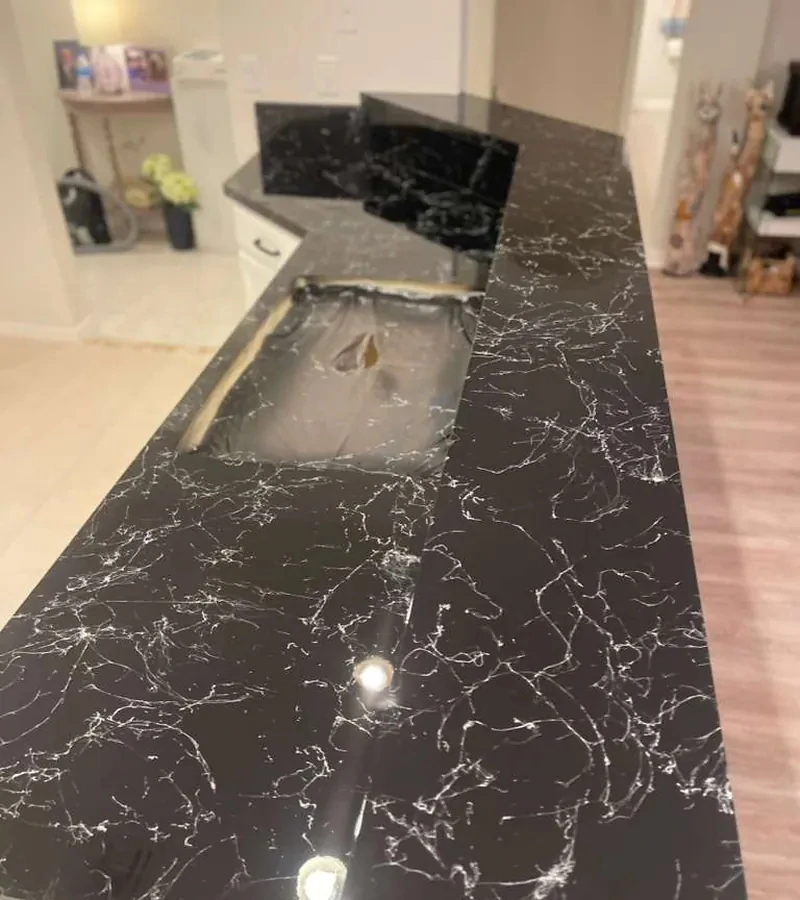 Refinished black marble epoxy kitchen countertop in Kissimmee FL.
