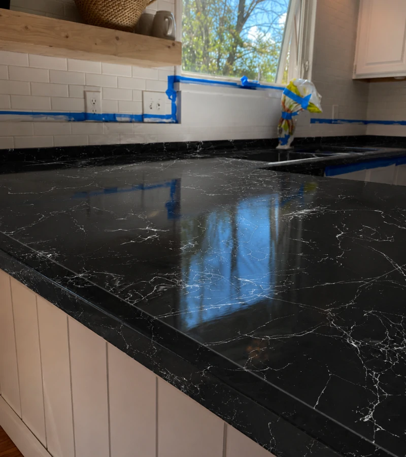 Ultra-glossy heat resistant black epoxy countertop coating in Kissimmee FL.