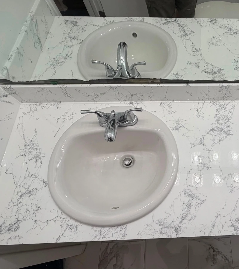 Marble look epoxy refinished bathroom vanity countertop in Kissimmee FL.