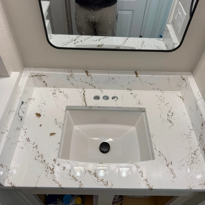 white-marble-epoxy-countertop-resurfacing-after-kissimmee. Custom white marble epoxy countertop finish on single sink vanity in Kissimmee FL